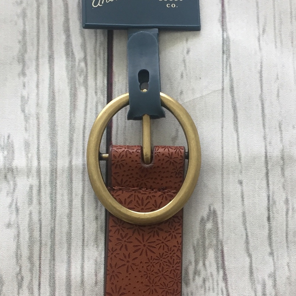 Camel belt with gold buckle.
